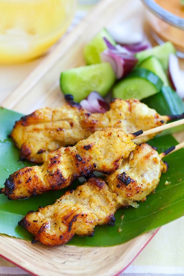 Chicken satay - grilled chicken skewers marinated with spices and served with peanut sauce. Easiest and BEST chicken satay recipe ever | rasamalaysia.com
