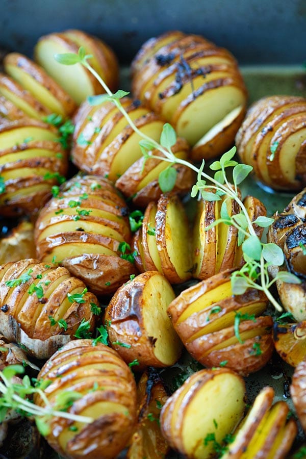 Homemade garlic Herb hasselback Potatoes with herb, olive oil butter and lemon.