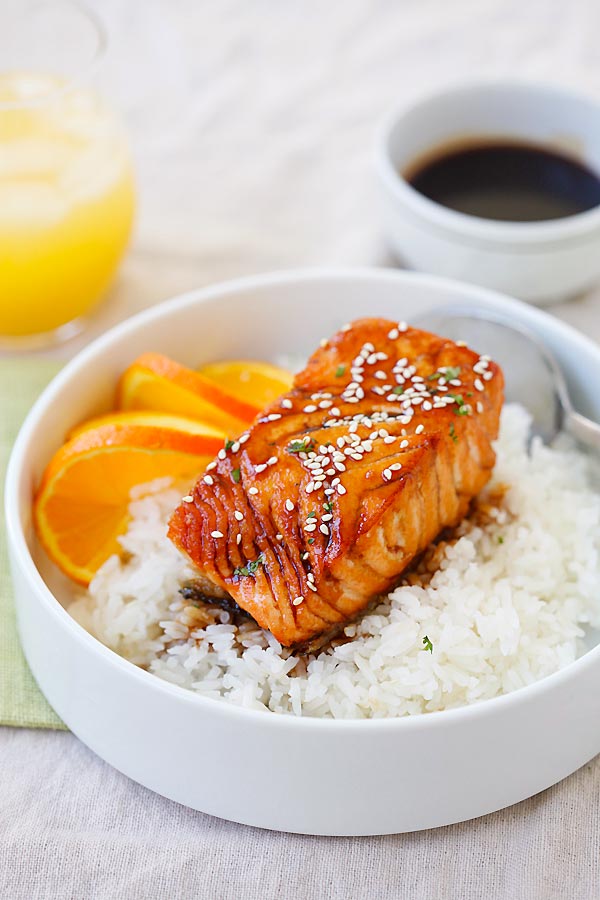 Easy Salmon with Orange Teriyaki Glaze sauce on top of rice.