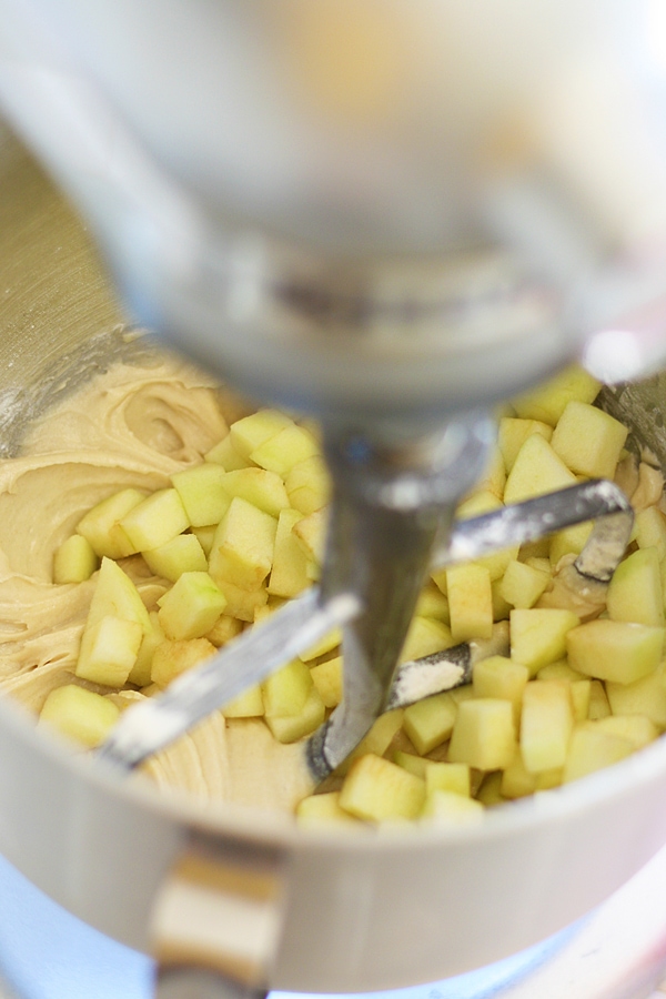 Apple coffee cake ingredient well mixed in KitchenAid mixer.
