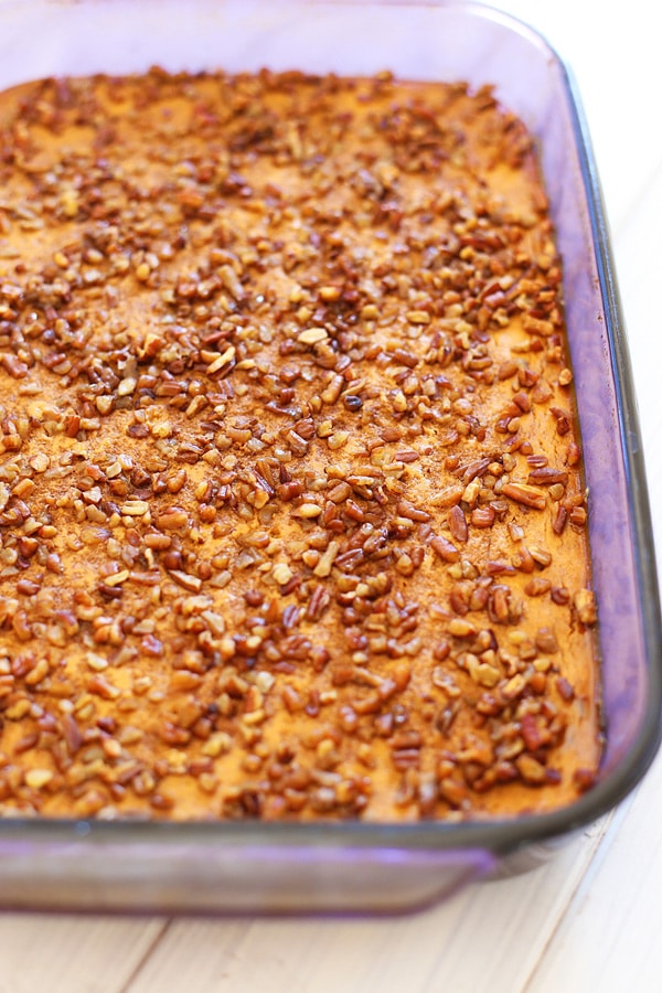 Easy homemade sweet, nutty, crumbly pumpkin pie dessert topped with toasted pecans.