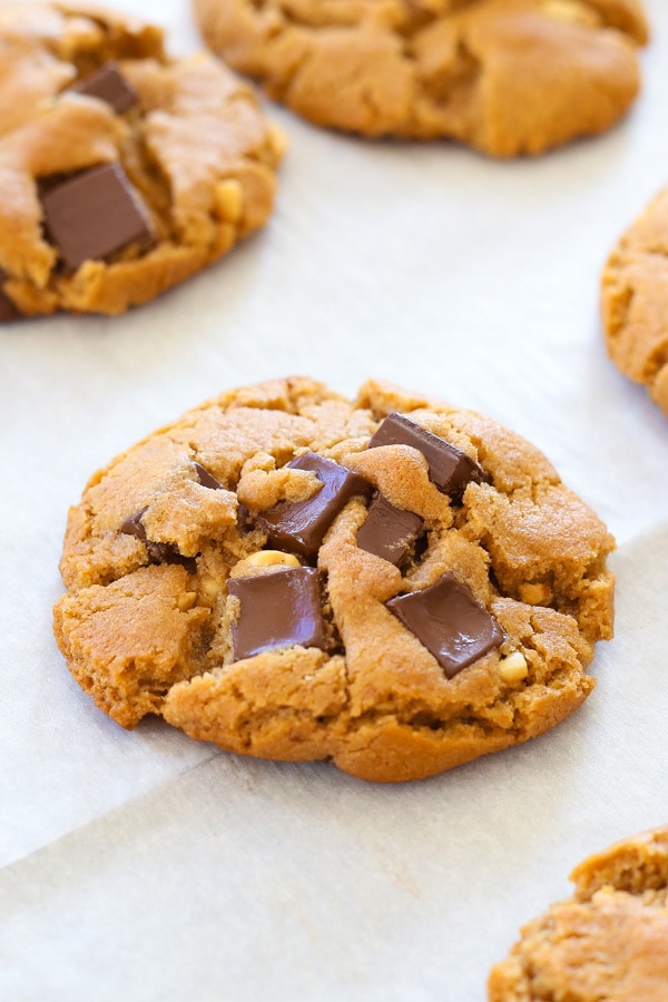 Ultimate best peanut butter dark chocolate chip cookies on a baking sheet.