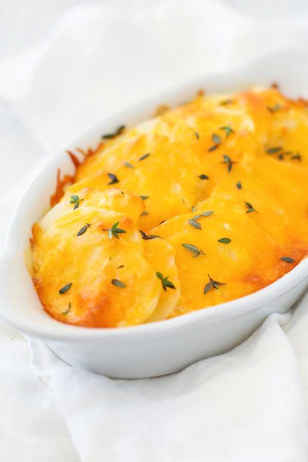 Easy and healthy homemade creamy, cheesy and rich scalloped potatoes.
