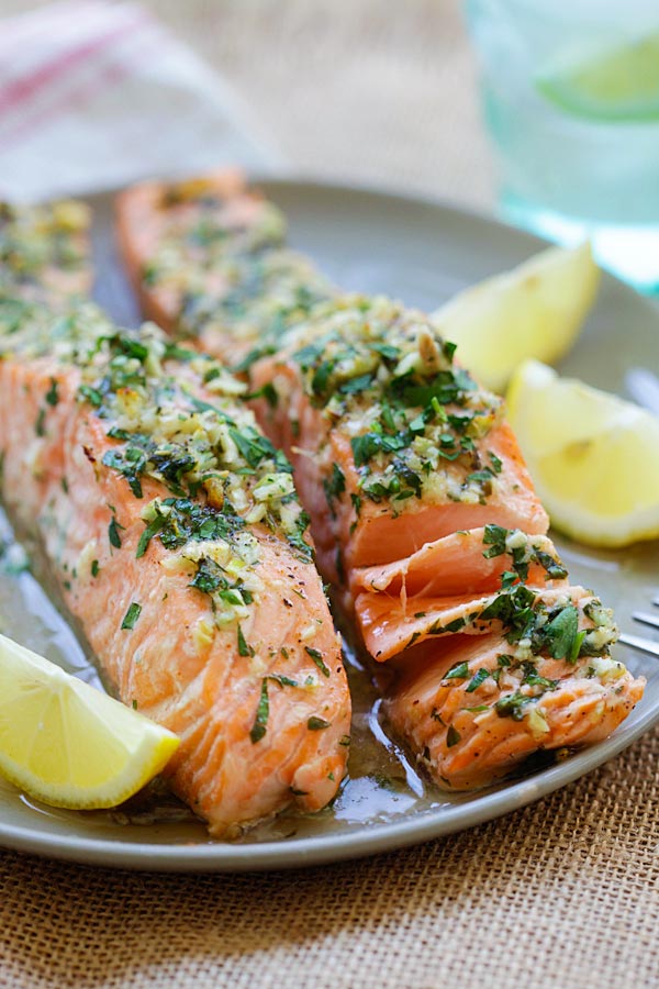 Healthy homemade roasted salmon in a plate, ready to serve.