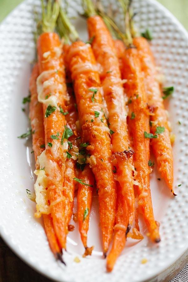 Garlic Parmesan Roasted Carrots - Oven roasted carrots with butter, garlic and Parmesan cheese. The easiest and most delicious side dish ever | rasamalaysia.com
