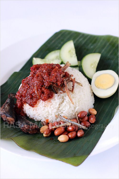 Nasi lemak - Malaysian coconut milk rice, served with sambal, fried crispy anchovies, toasted peanuts and cucumber. This is the best and most authentic nasi lemak recipe | rasamalaysia.com