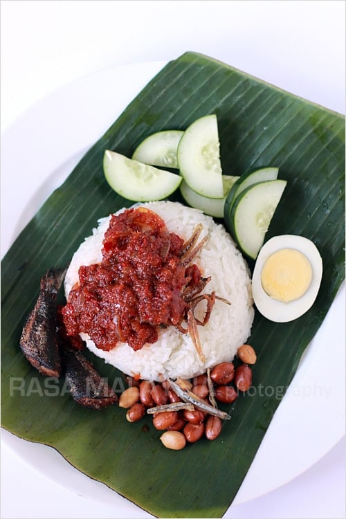 Homemade authentic Malaysian Nasi lemak served on a banana leaf.