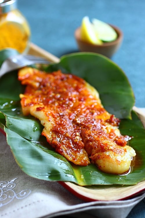 Ikan Panggang/Ikan Bakar Recipe (Grilled Fish with Banana Leaves): Loaded with dollops of sambal or spice paste, the fish is grilled with banana leaves over charcoal fire. | rasamalaysia.com