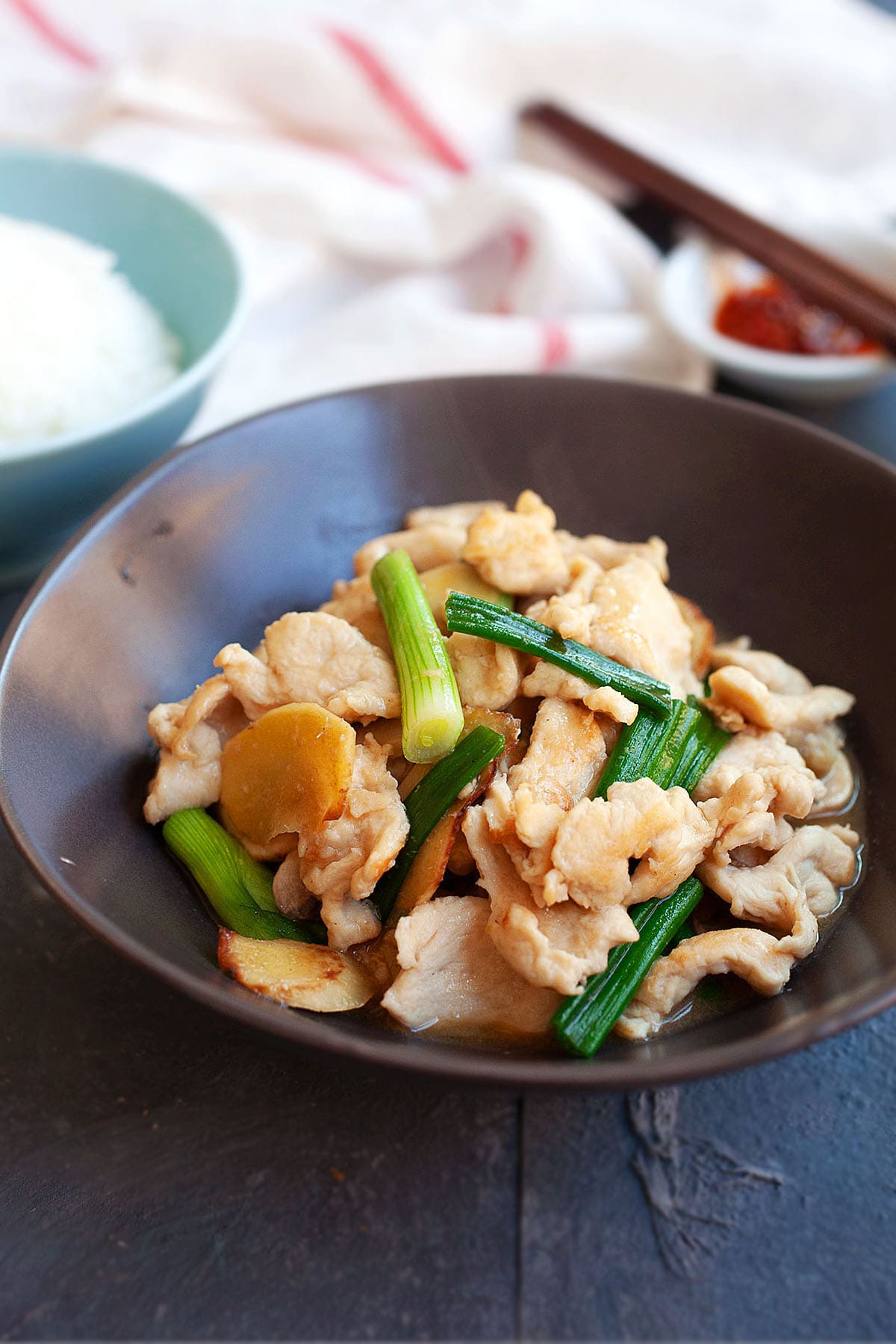 Cantonese ginger and scallion chicken with savory brown ginger scallion sauce. 