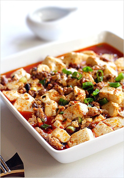 Super delicious mapo tofu featuring cut up tofu and minced meat in a bowl.