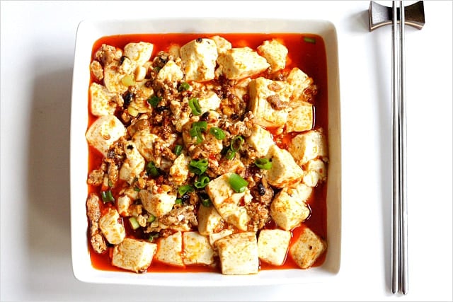 Easy mapo tofu recipe with delicious tofu and minced meat, with scallions on top.