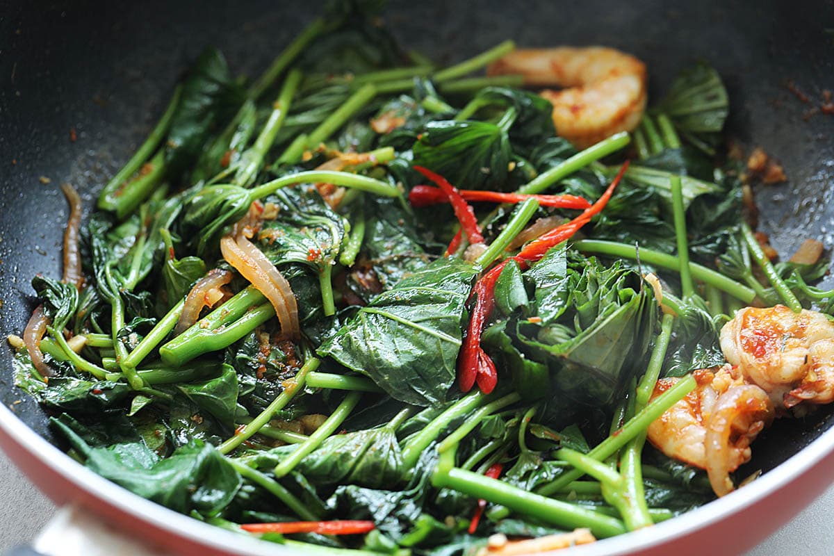 Sweet potato leaves recipe with sambal and shrimp, ready to serve.