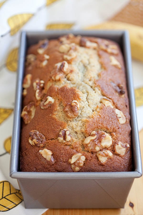 Banana bread freshly baked in a bread tray.