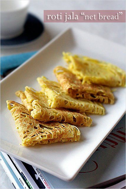 Roti Jala, lacy pancakes. So yummy with chicken curry. | rasamalaysia.com