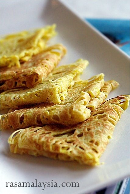 Roti Jala, lacy pancakes. So yummy with chicken curry. | rasamalaysia.com