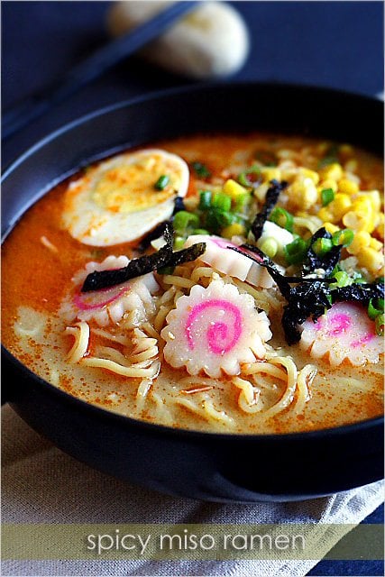 Spicy Miso Ramen with colorful Japanese fishcake and scallions in serving dish