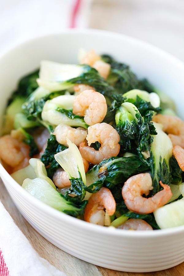 Shrimp stir fried with baby bok choy, making a delicious vegetable dish.