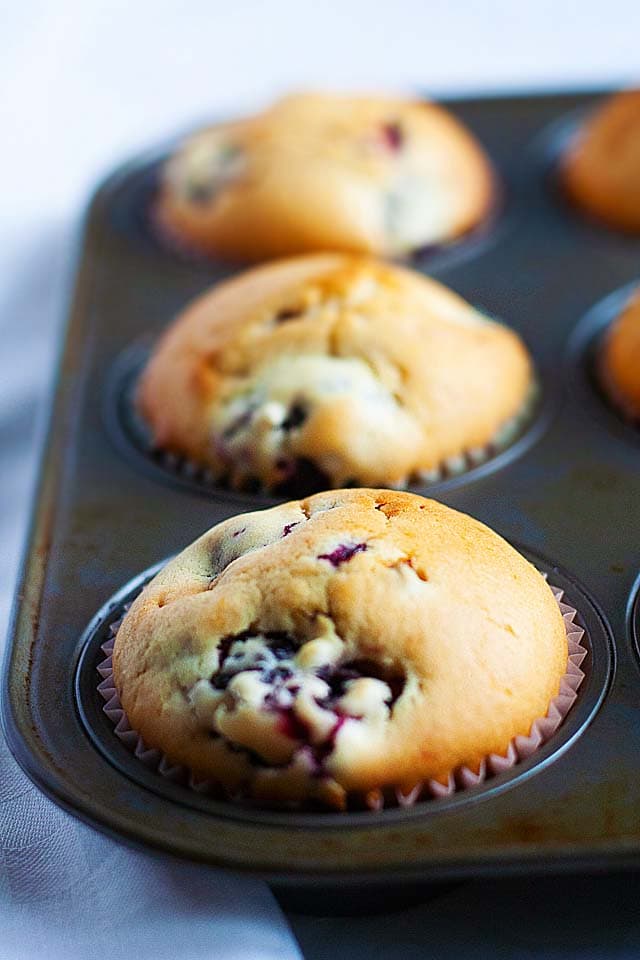 Moist and soft blueberry muffin recipe using butter, flour, blueberries and milk.