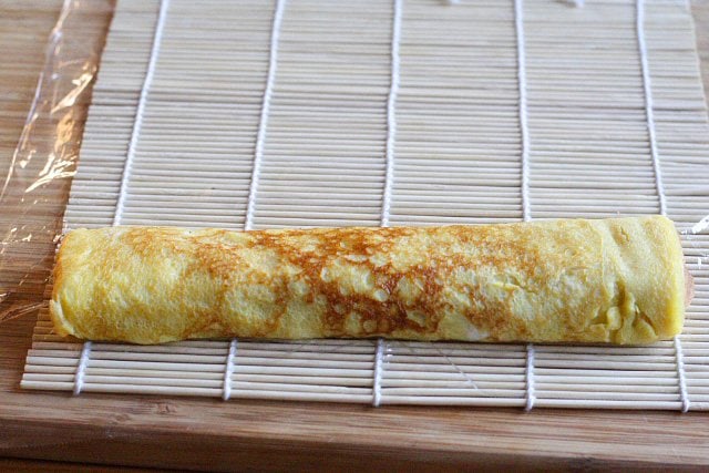 Tamagoyaki is a slightly sweet, delicious, and delicate omelet that is often packed into Japanese bento boxes and also served at sushi bars as tamago nigiri | rasamalaysia.com
