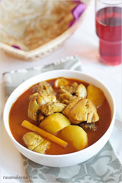 Chicken curry recipe with chicken, potatoes and spices in a curry sauce, ready to serve.
