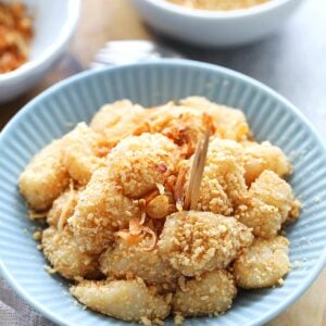 Muah chee or muar chee served on a plate with toothpicks.