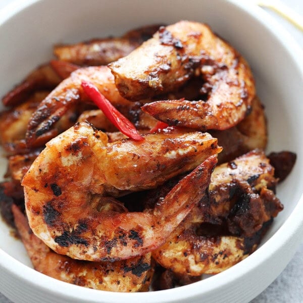 Assam prawns or tamarind prawns served in a bowl.