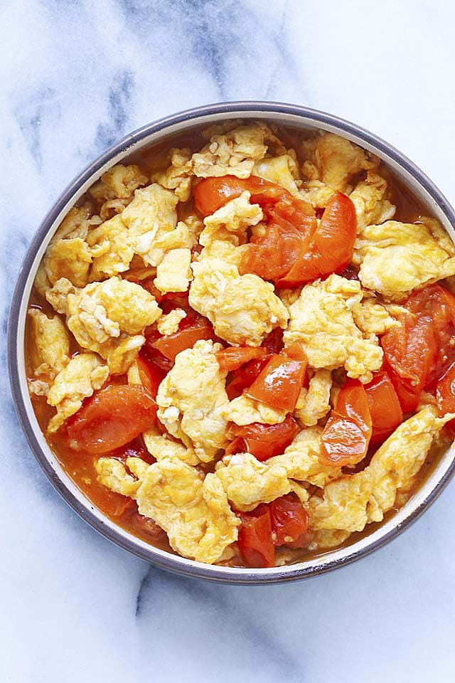 Tomato eggs with scrambled eggs and tomato, ready to serve. 