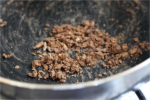 Toasting Shrimp Paste (Belacan) for Sambal Belacan making.