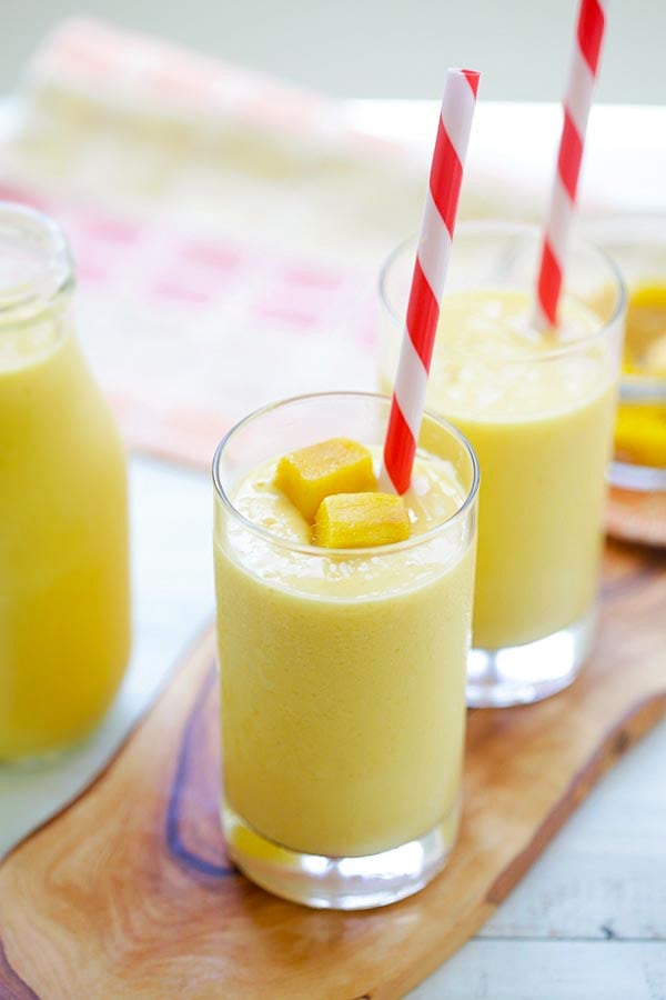 Mango Lassi - a rich, popular Indian smoothie with fresh mango, yogurt and honey. Easy recipe that takes 10 mins to make! | rasamalaysia.com