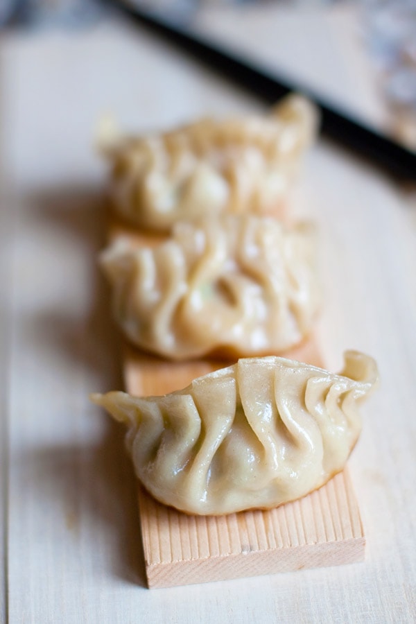 Gyoza or Japanese pan-fried dumplings are SO delicious. EASY gyoza recipe made with store-bought ingredients, cheap & a zillion times better than takeout. | rasamalaysia.com