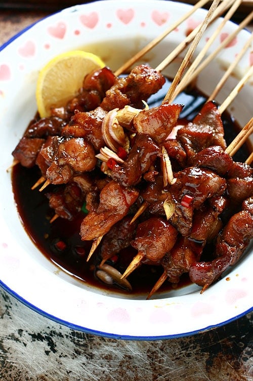 Indonesian Sate (sate) served on a plate.