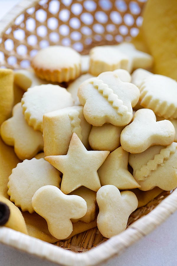 Cute shaped Danish butter cookies, placed in a basket, ready to serve.