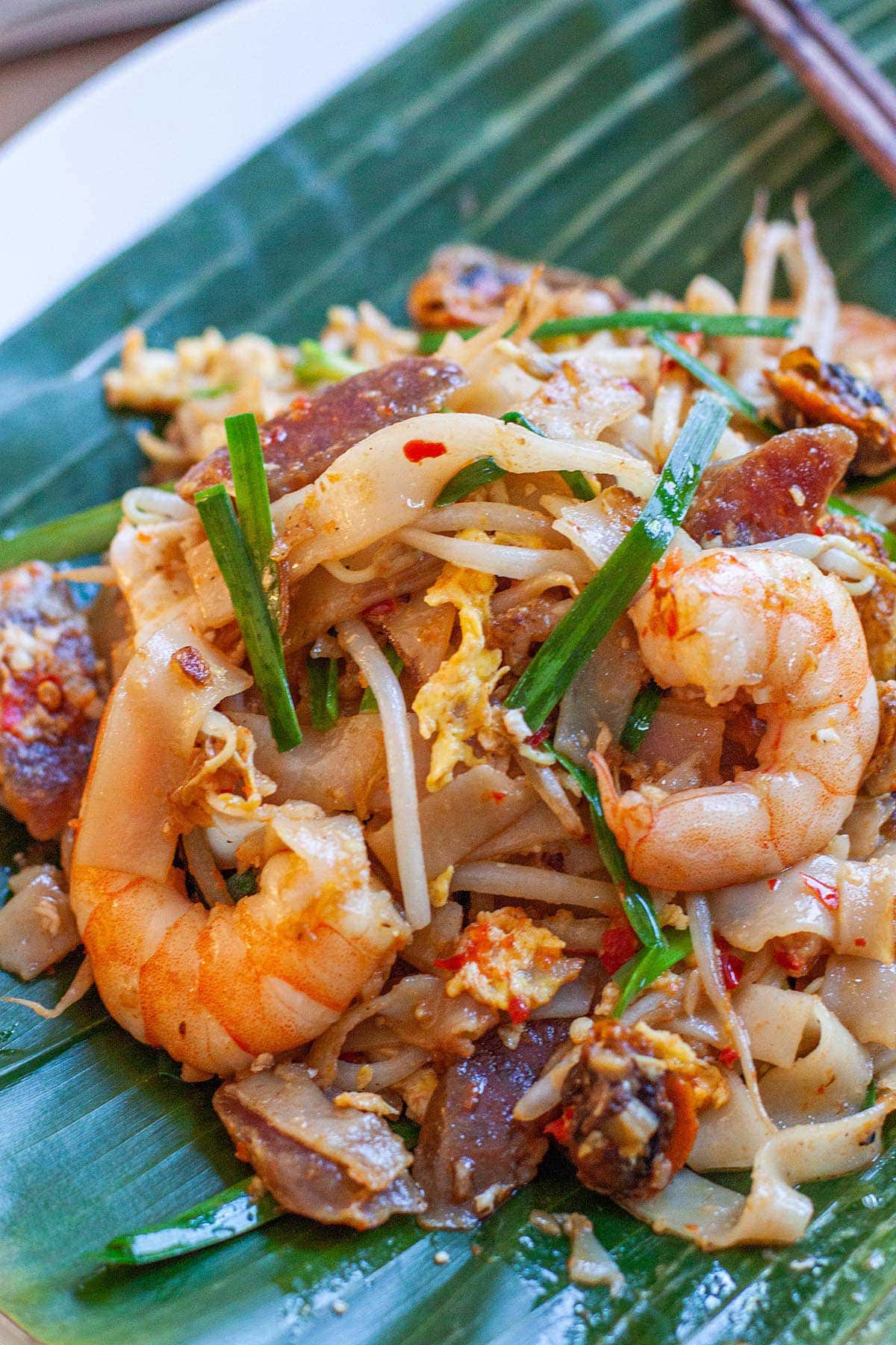 Authentic Penang Char Kuey Teow with step-by-step recipe guide. Char Kuey Teow is a famous Penang hawker food. The best Char Kuey Teow recipe on the web. | rasamalaysia.com