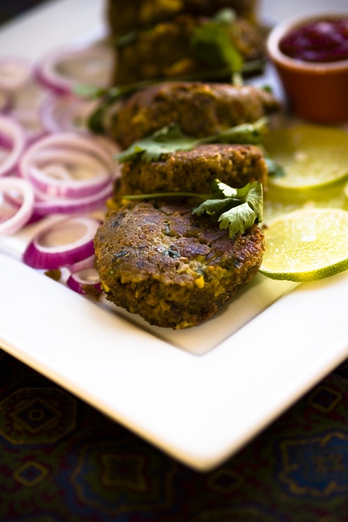 Lamb Kabab Recipe (Shammi Kabab): The mixture is elevated with warmth of spices like cinnamon, cardamom and cloves, stuffed with onion and coriander, rolled into thickish patties, dipped in egg and fried in ghee (clarified butter) to create a meal that is exquisite, both on your dish and to your palette. | rasamalaysia.com