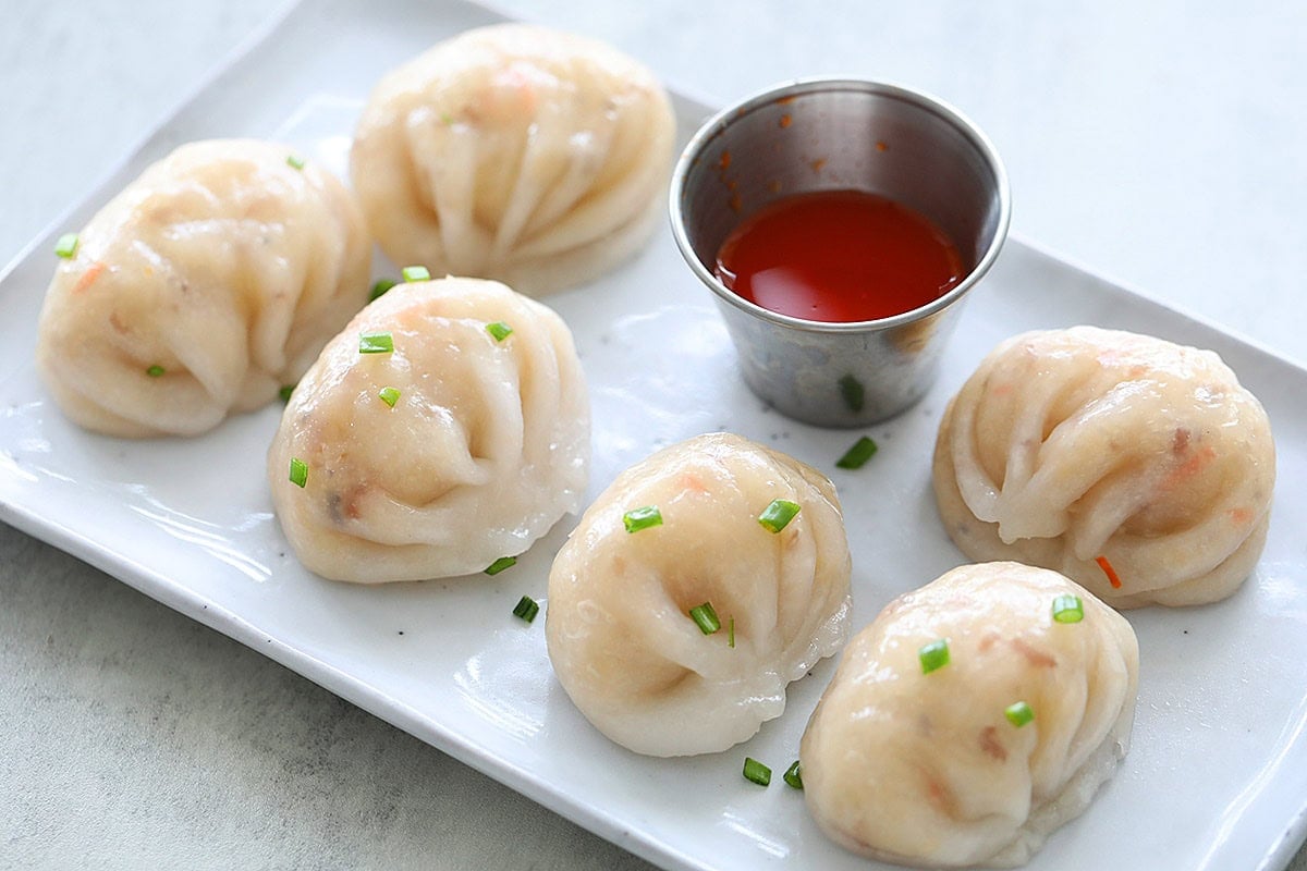 Freshly steamed Teochew chai kuih served with chili sauce on the side.