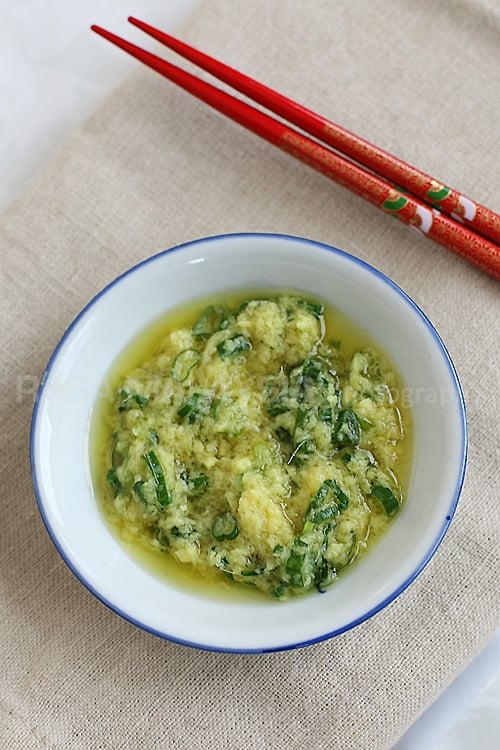 Soy Sauce Chicken - dark and glossy whole chicken dunked in a soy sauce mix. Also try dipping it with the ginger and scallion condiment. | rasamalaysia.com