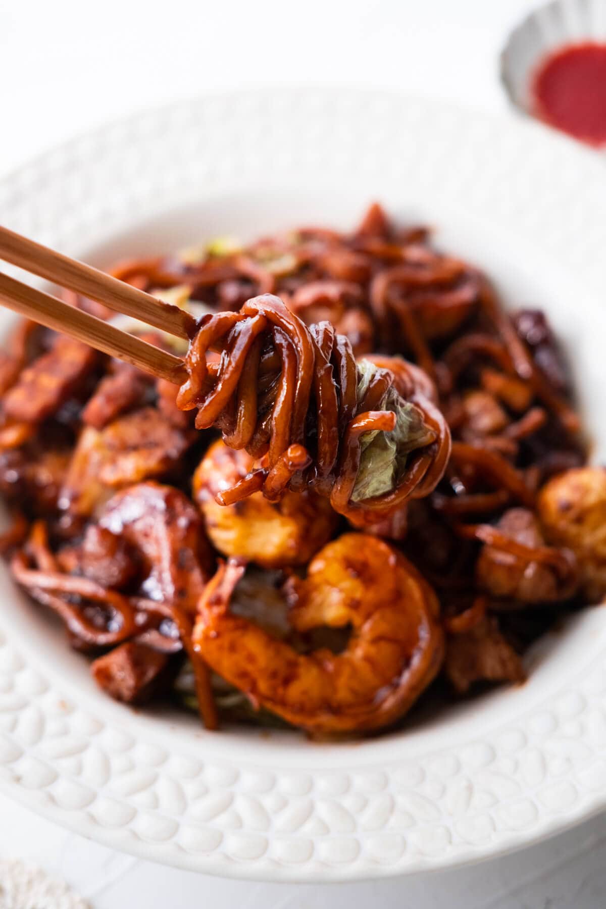 KL Hokkien Mee picked up with chopsticks.