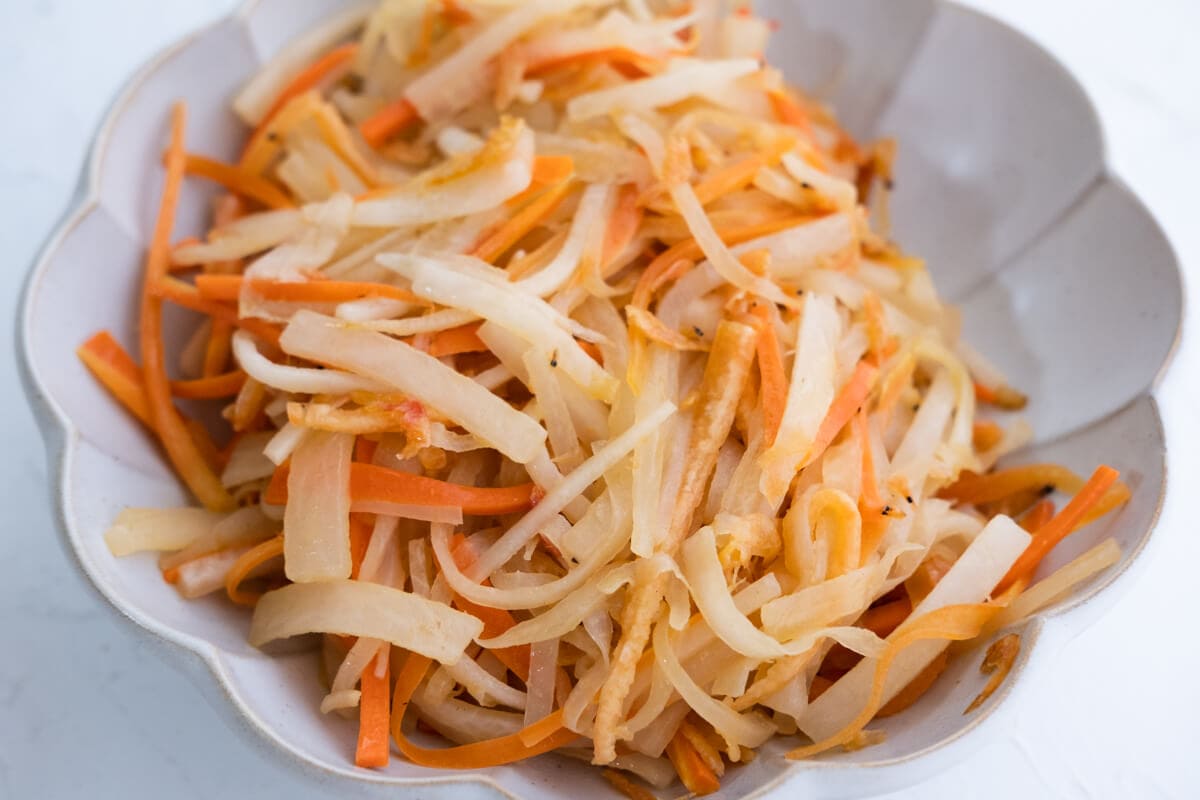 Stir-fried jimaca and carrots in a bowl. 