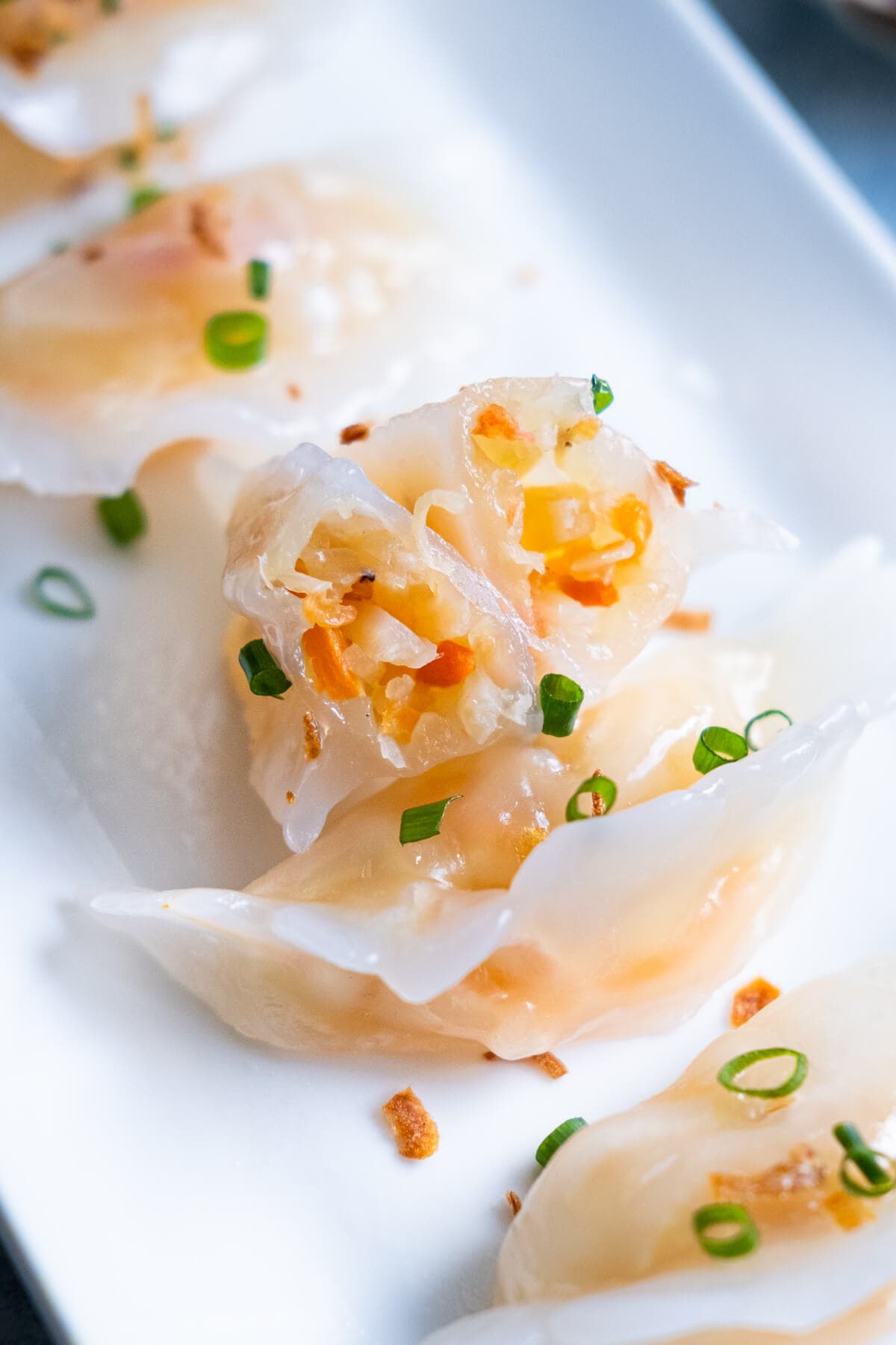 Steamed vegetable dumplings (chai kueh) filled with stir-fried jicama and carrots. 