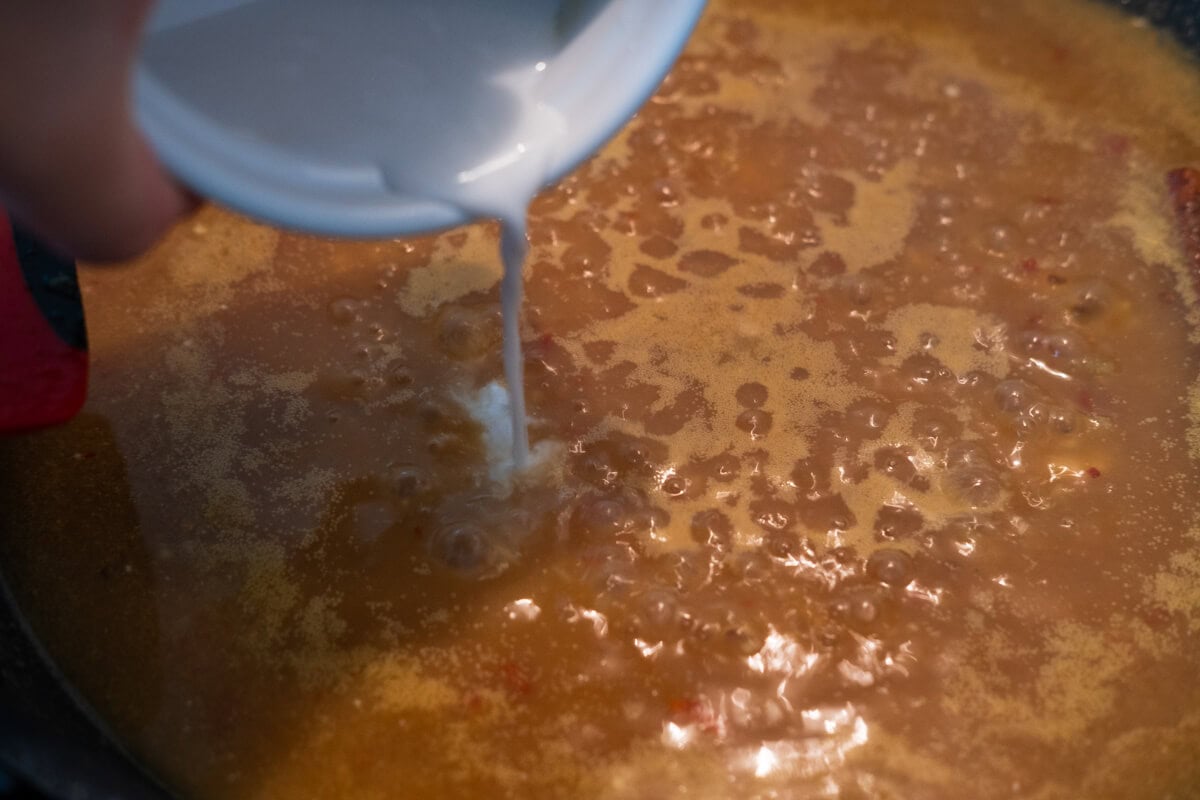 Add the coconut milk to the gravy. 