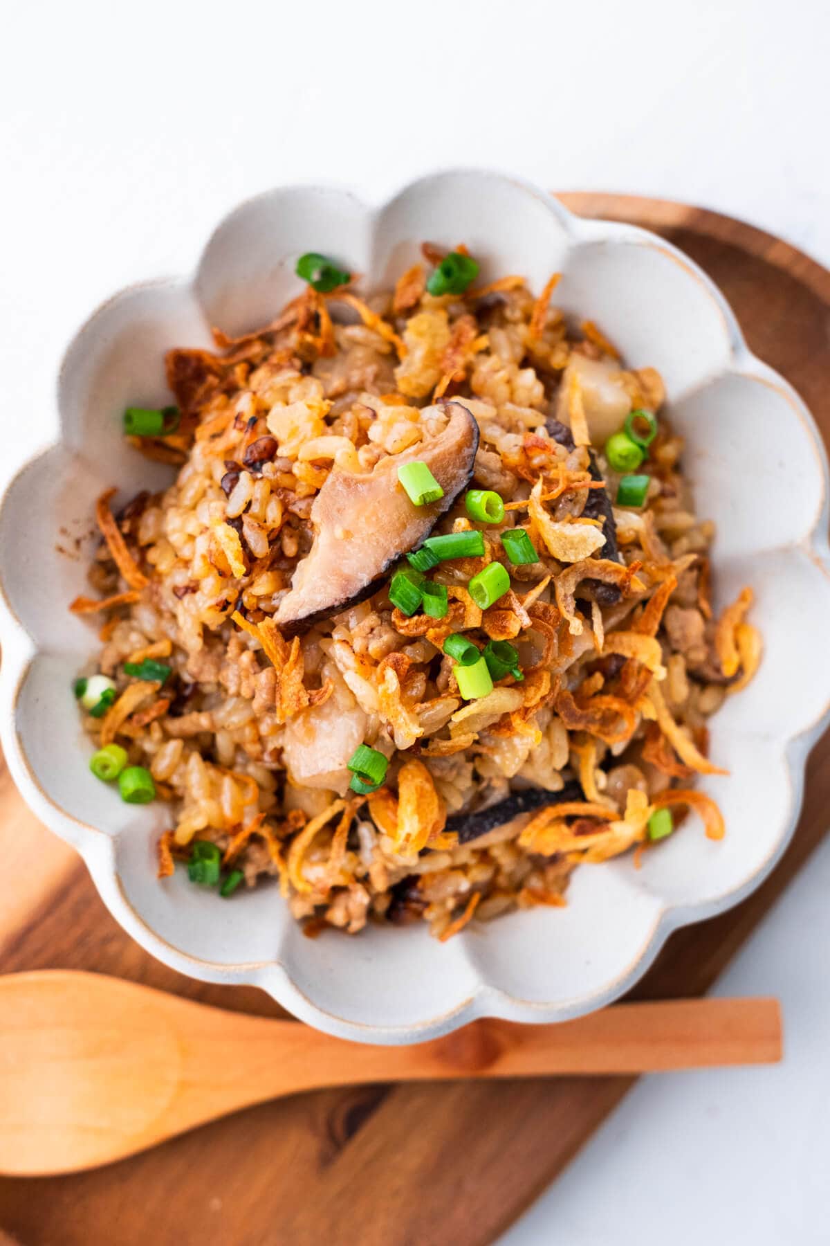 One pot yam rice made in a rice cooker, served in a bowl.