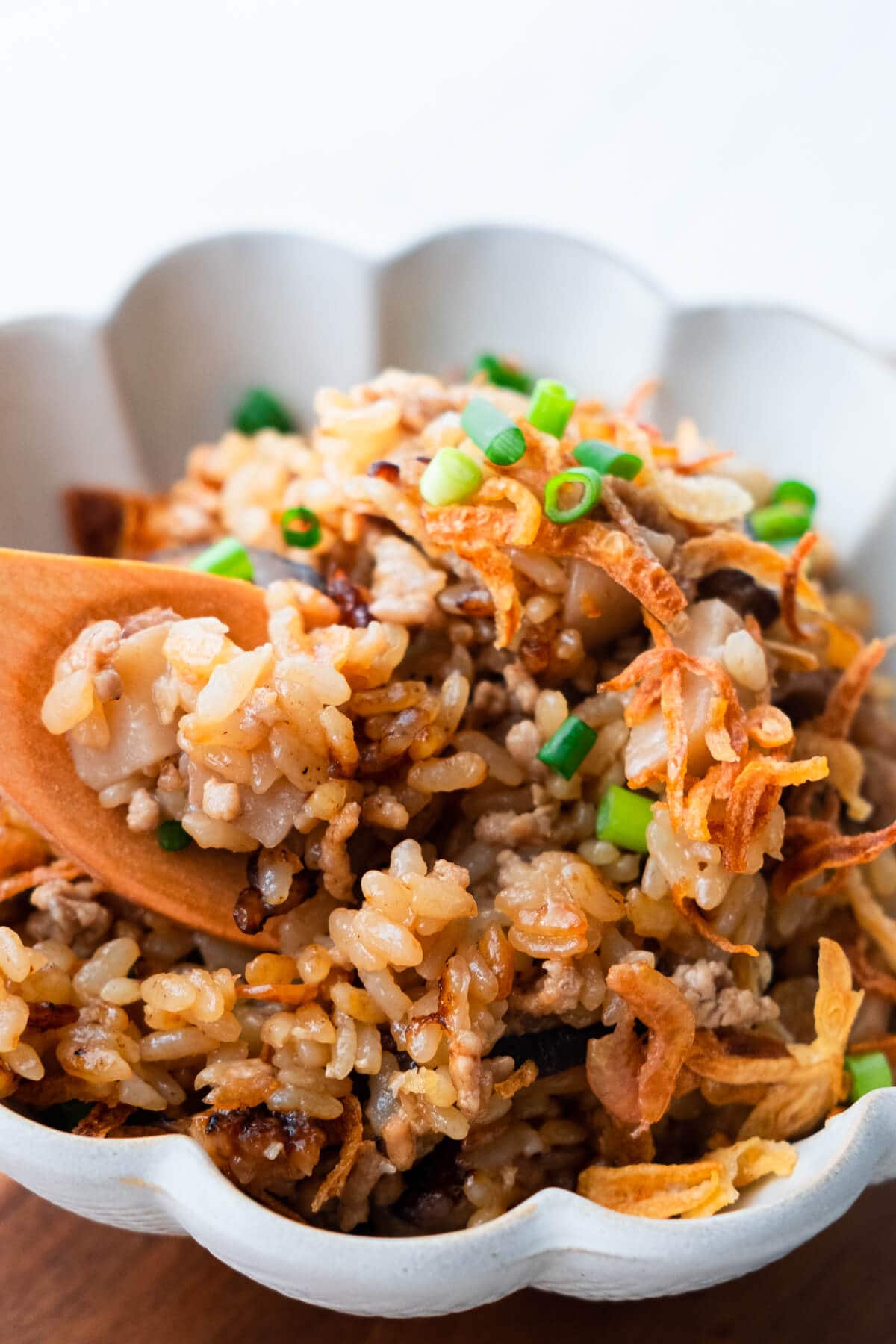 Malaysia yam rice scooped with a spoon.