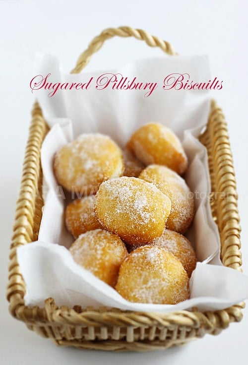 Cheater Donuts using Pillsbury biscuits. Fluffy, light, pillowy and oh-so-YUM. These sugared Pillsbury biscuits are the BEST! | rasamalaysia.com