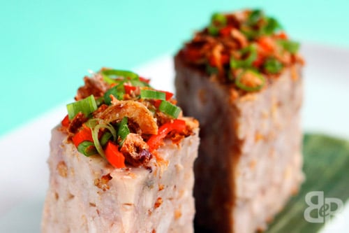 Yam Cake Recipe (Or Kuih) recipe - This is basically a steamed cake made from yam pieces, dried prawns and rice flour. It is then topped with deep fried shallots, spring onions, chillis and dried prawns, and usually served with a chilli dipping sauce. | rasamalaysia.com