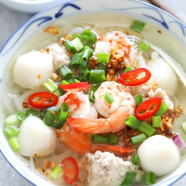 Rice noodle soup topped with shrimp, fish balls, ground pork, scallion and garlic oil.