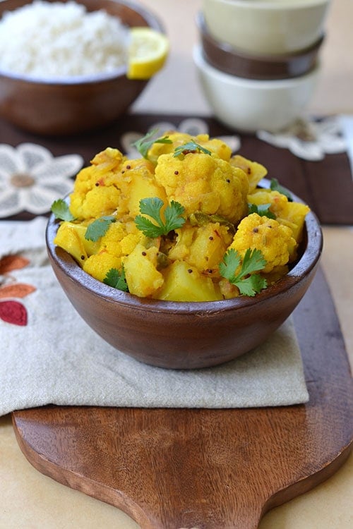 Delicious aloo gobi, or potatoes and cauliflower, placed in a bowl.