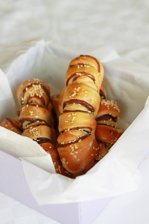 Easy and quick Japanese red bean roll bread served in a basket.