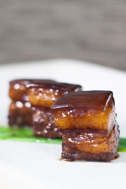 Creamy, juicy, melt in your mouth red-cooked pork belly in dark brown glaze.