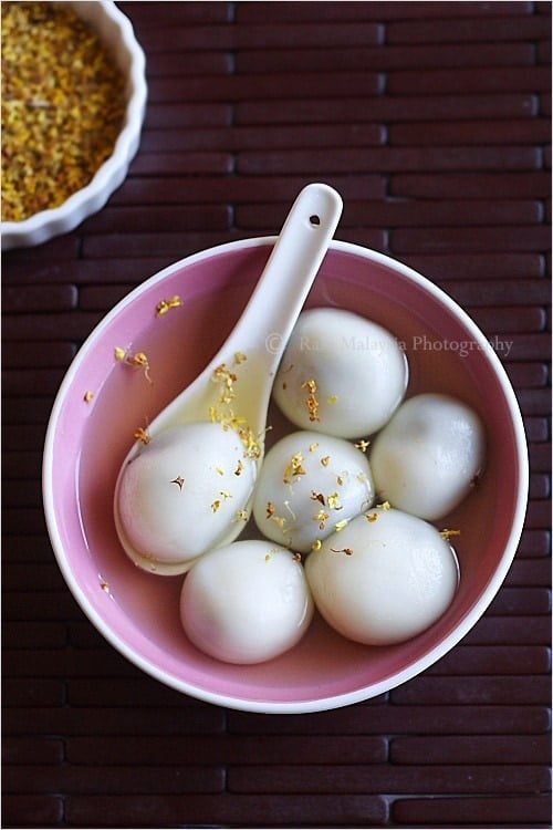 Easy Chinese dessert black sesame dumpling served with ginger syrup.