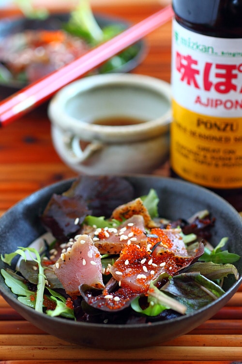 Healthy homemade Japanese salad with Asian greens, seaweed, tobiko and ahi tuna.